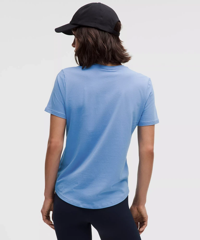 Love Curved-Hem Crewneck T-Shirt | Women's Short Sleeve Shirts & Tee's