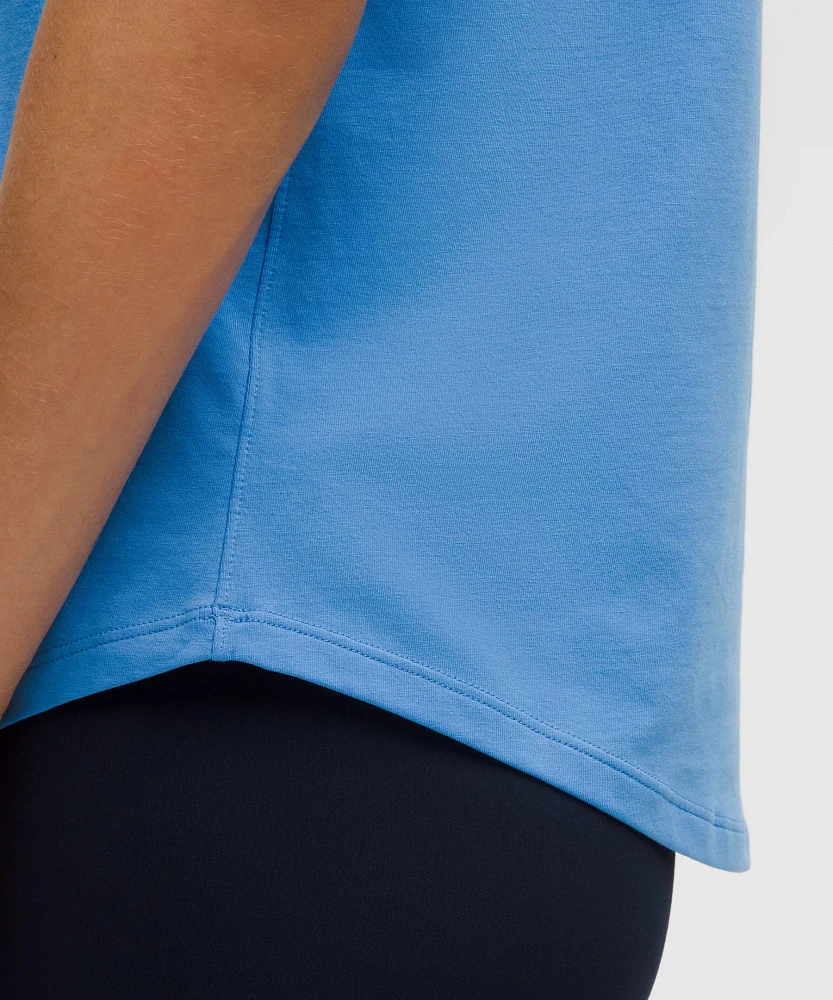 Love Curved-Hem Crewneck T-Shirt | Women's Short Sleeve Shirts & Tee's
