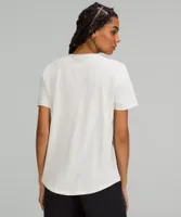 Love Curved-Hem Crewneck T-Shirt | Women's Short Sleeve Shirts & Tee's