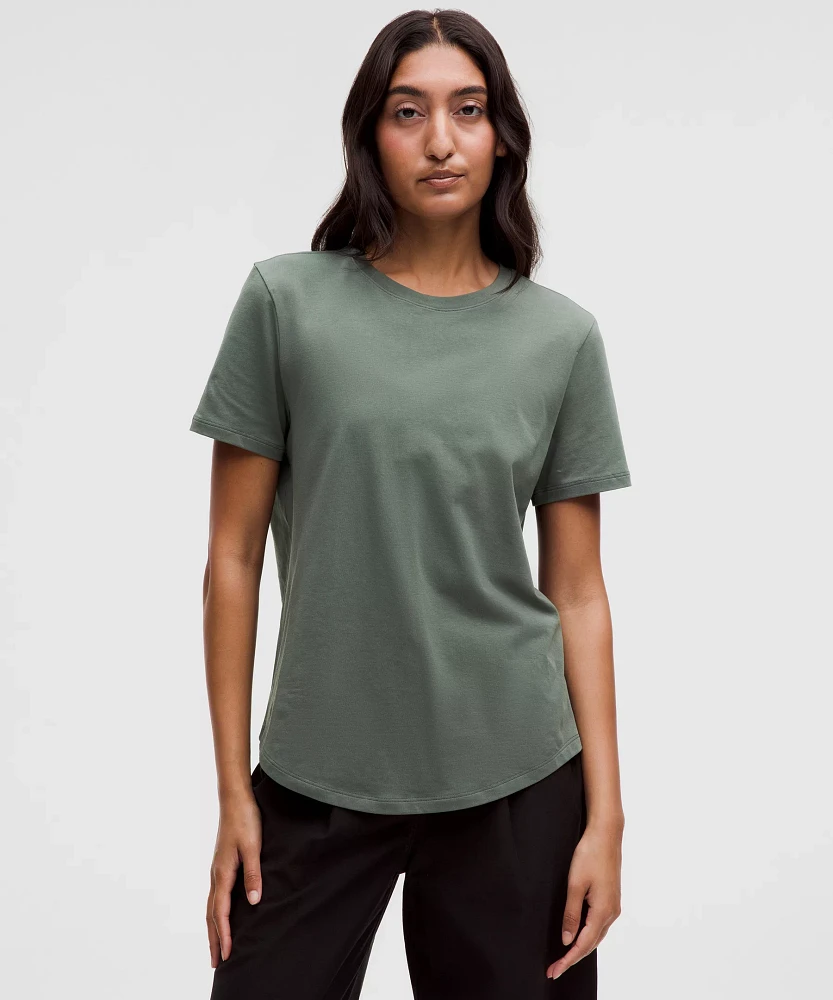 Love Curved-Hem Crewneck T-Shirt | Women's Short Sleeve Shirts & Tee's