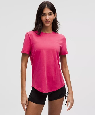 Love Curved-Hem Crewneck T-Shirt | Women's Short Sleeve Shirts & Tee's