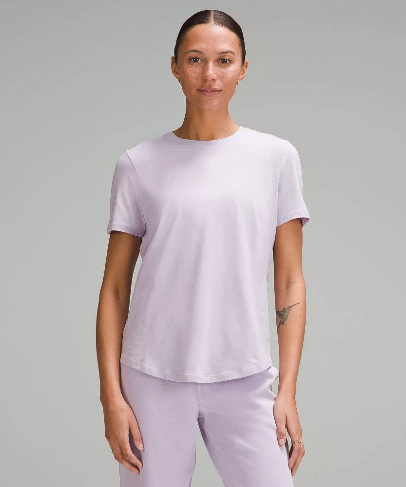 Love Curved-Hem Crewneck T-Shirt | Women's Short Sleeve Shirts & Tee's