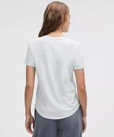 Love Curved-Hem Crewneck T-Shirt | Women's Short Sleeve Shirts & Tee's