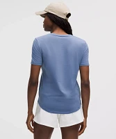Love Curved-Hem Crewneck T-Shirt | Women's Short Sleeve Shirts & Tee's