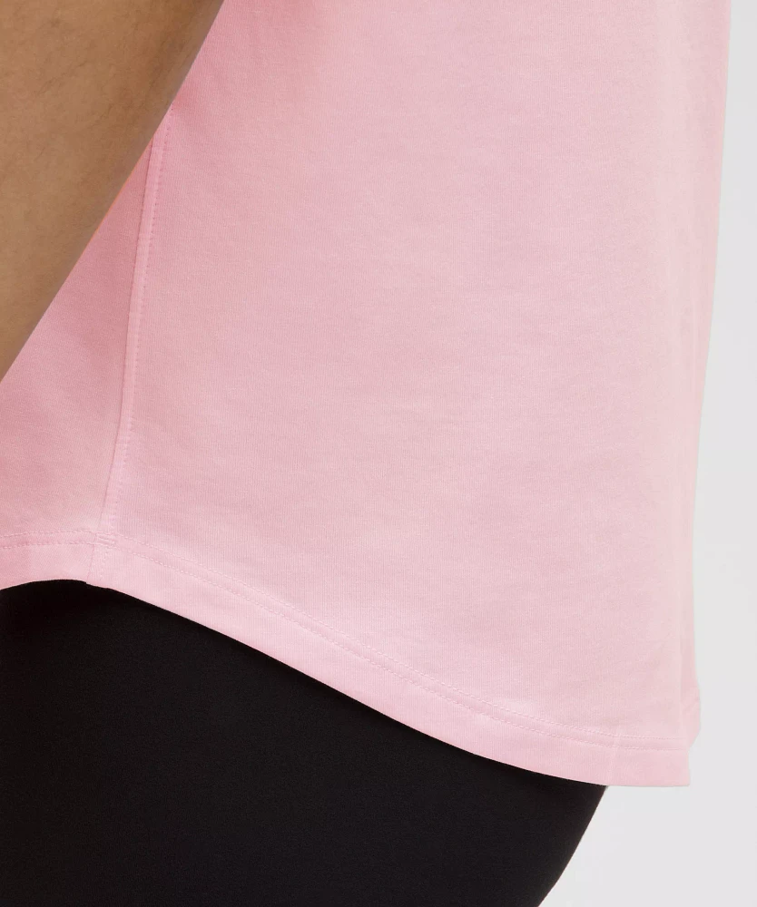 Love Curved-Hem Crewneck T-Shirt | Women's Short Sleeve Shirts & Tee's