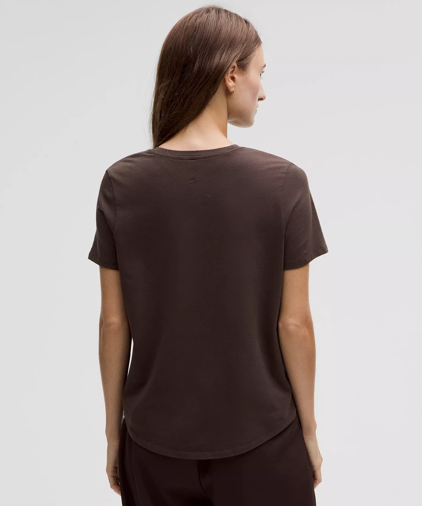 Love Curved-Hem Crewneck T-Shirt | Women's Short Sleeve Shirts & Tee's