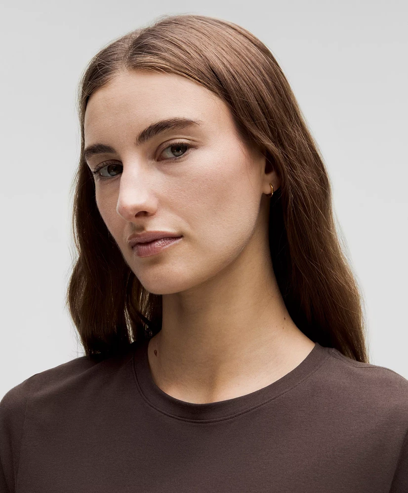 Love Curved-Hem Crewneck T-Shirt | Women's Short Sleeve Shirts & Tee's