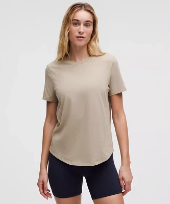Love Curved-Hem Crewneck T-Shirt | Women's Short Sleeve Shirts & Tee's