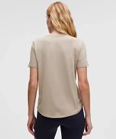 Love Curved-Hem Crewneck T-Shirt | Women's Short Sleeve Shirts & Tee's