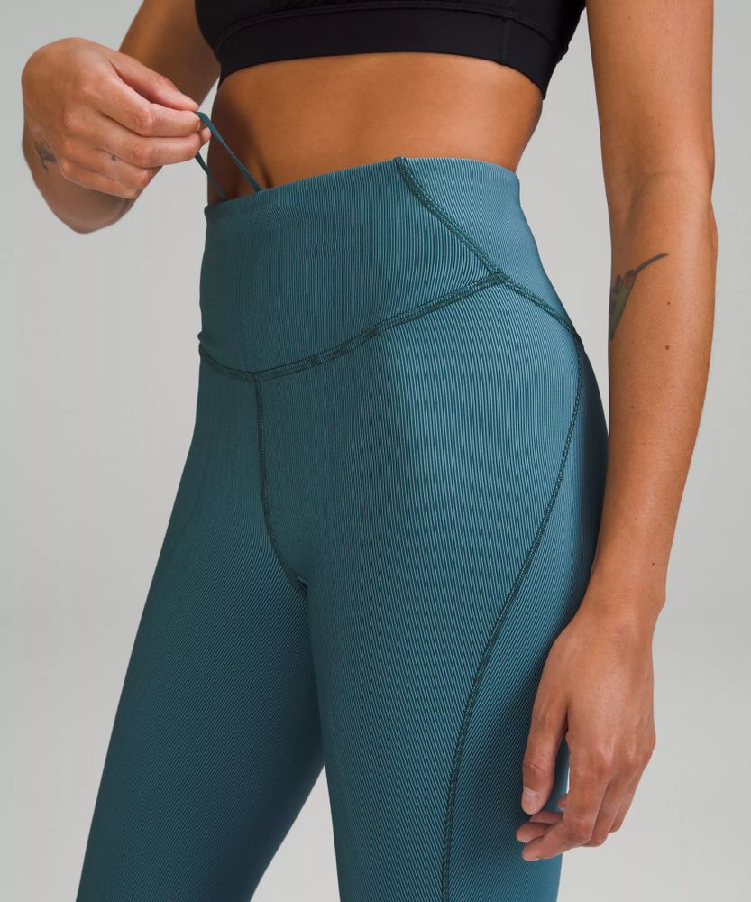 Base Pace High-Rise Running Tight 25 High-Rise Crop with Pockets