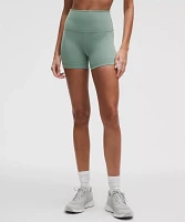 Wunder Train High-Rise Short 4" | Women's Shorts