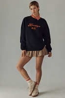 KULE The Oversized Brooklyn Graphic Sweatshirt