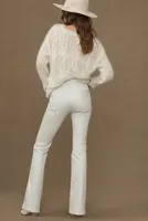 The Icon Pearlescent High-Rise Flare Jeans by Pilcro