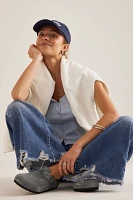 The Adi Regenerative Cotton Mid-Rise Frayed Relaxed Flare Jeans by Pilcro
