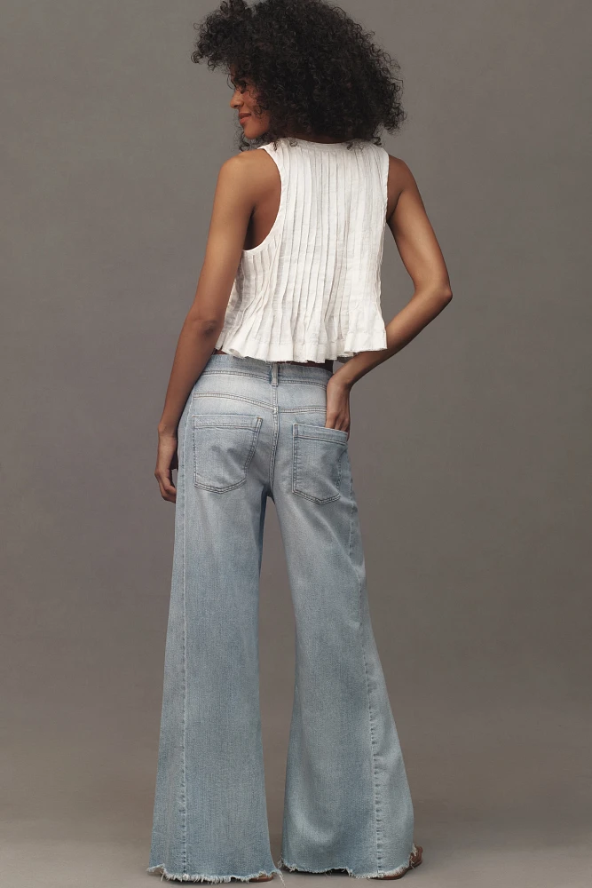 The Adi Mid-Rise Frayed Relaxed Flare Jeans by Pilcro