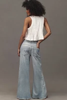 The Adi Mid-Rise Frayed Relaxed Flare Jeans by Pilcro