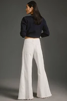 The Adi Mid-Rise Frayed Relaxed Flare Jeans by Pilcro