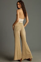 The Adi Mid-Rise Frayed Relaxed Flare Jeans by Pilcro