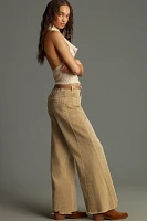 The Adi Mid-Rise Frayed Relaxed Flare Jeans by Pilcro