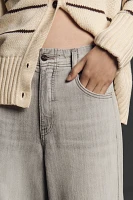 The Adi Mid-Rise Frayed Relaxed Flare Jeans by Pilcro