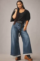 The Emory Pleated High-Rise Wide-Leg Jeans by Pilcro