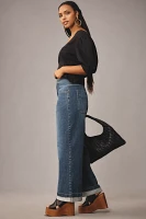 The Emory Pleated High-Rise Wide-Leg Jeans by Pilcro