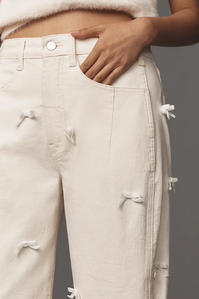 The Kenna Mid-Rise Heritage Barrel Jeans by Pilcro: Bow Edition