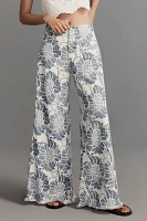 The Adi Mid-Rise Frayed Relaxed Flare Pants by Pilcro: Printed Linen Edition