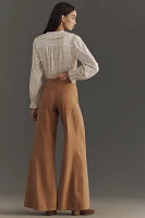 The Adi Mid-Rise Frayed Relaxed Flare Pants by Pilcro: Herringbone Edition