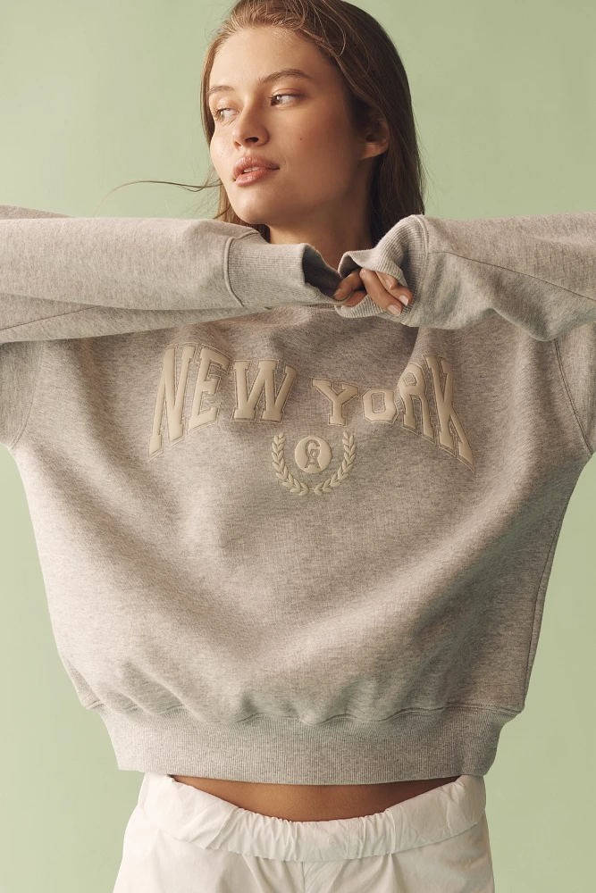 Good American x Anthropologie New York Graphic Crew-Neck Sweatshirt