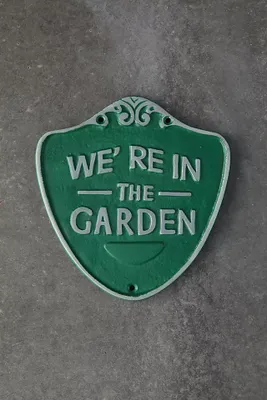 Iron We're in the Garden Sign