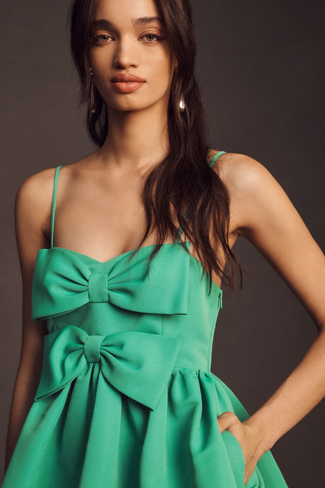 Sachin & Babi Sloane Taffeta Double-Bow Pleated Colorblock Mini Dress at MarketFair Shoppes in Princeton, NJ Sachin & Babi Sloane Taffeta Double-Bow Pleated Colorblock Mini Dress at MarketFair Shoppes in Princeton, NJ