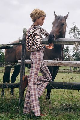 Just Float On Printed Flare Jeans by We The Free at People, Dark Chocolate Combo Plaid,