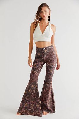 Just Float On Printed Flare Jeans by We The Free at People, Dark Brown,