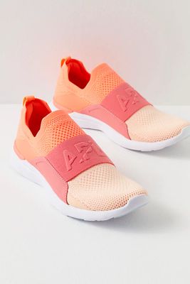 APL Techloom Bliss Trainers by APL at Free People, Laser Red / Fire Coral / Faded Peach, US 8