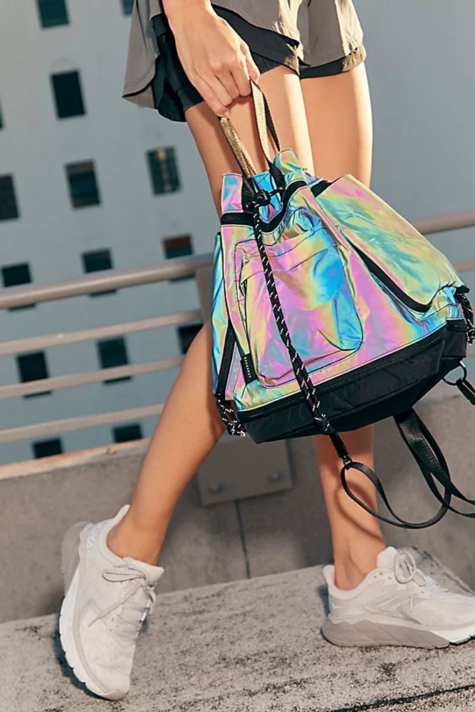 Limelight Reflective Pyramid Backpack by Doughnut at Free People, Dark Rainbow, One Size
