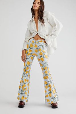 Venice Beach Printed Flare Jeans by We The Free at People, Sky Combo Cali Poppies,