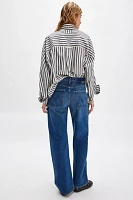 MOTHER The Lasso Utility Sneak Jeans