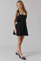 BDG Leah Denim Pleated Open-Back Drop Waist Mini Dress