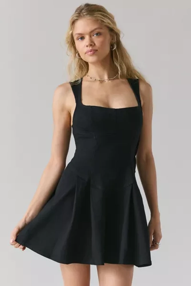 BDG Leah Denim Pleated Open-Back Drop Waist Mini Dress