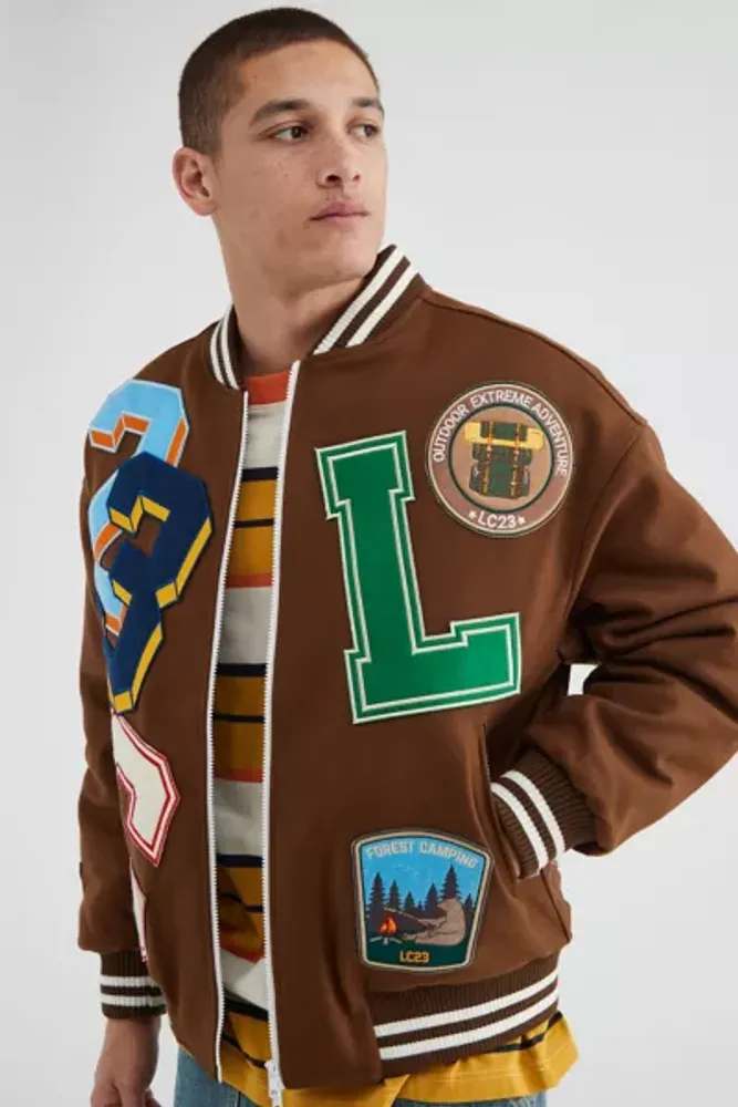 Urban Outfitters LC23 Multi Patch Varsity Jacket | The Summit