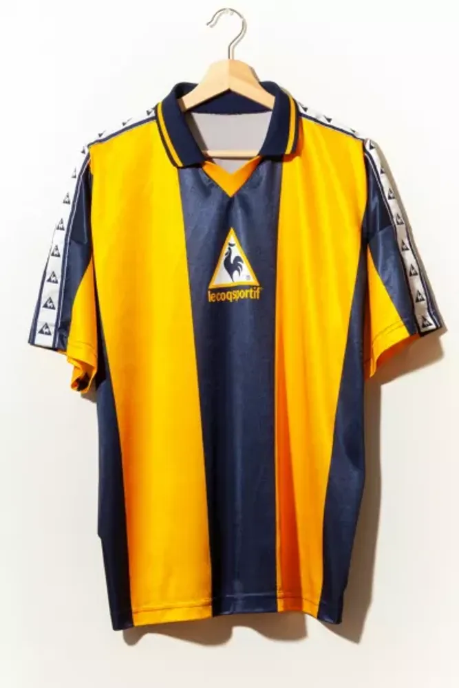 haalbaar Spelen met Ik denk dat ik ziek ben Urban Outfitters Vintage 1990s Distressed Le Coq Sportif Blue Yellow Soccer  Jersey | The Summit