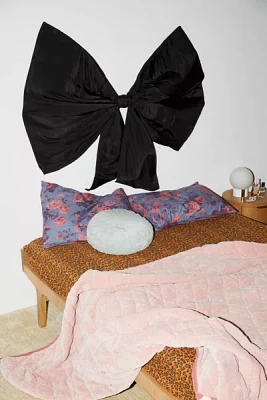 Bow Upholstered Floating Headboard