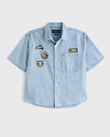 Short Sleeve Cropped Graphic Denim Button-Up Shirt