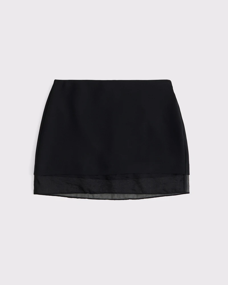 Mid Rise Sheer Hem Mini Skort