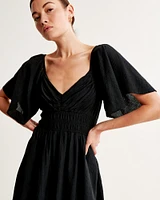 Angel Sleeve Smocked Waist Mini Dress