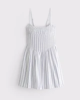 Dipped-Waist Smocked Mini Dress