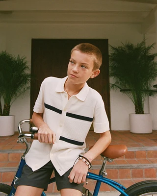 button-through sweater polo