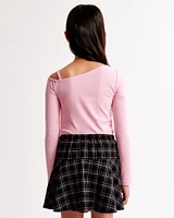 long-sleeve off-the-shoulder cinched top