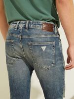 Distressed Knee Slim Jeans